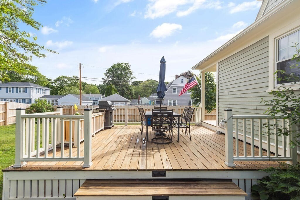 7 Charles Street Maynard, MA 01754 - Photo 30 of 33 a view of a balcony with dining table and chairs