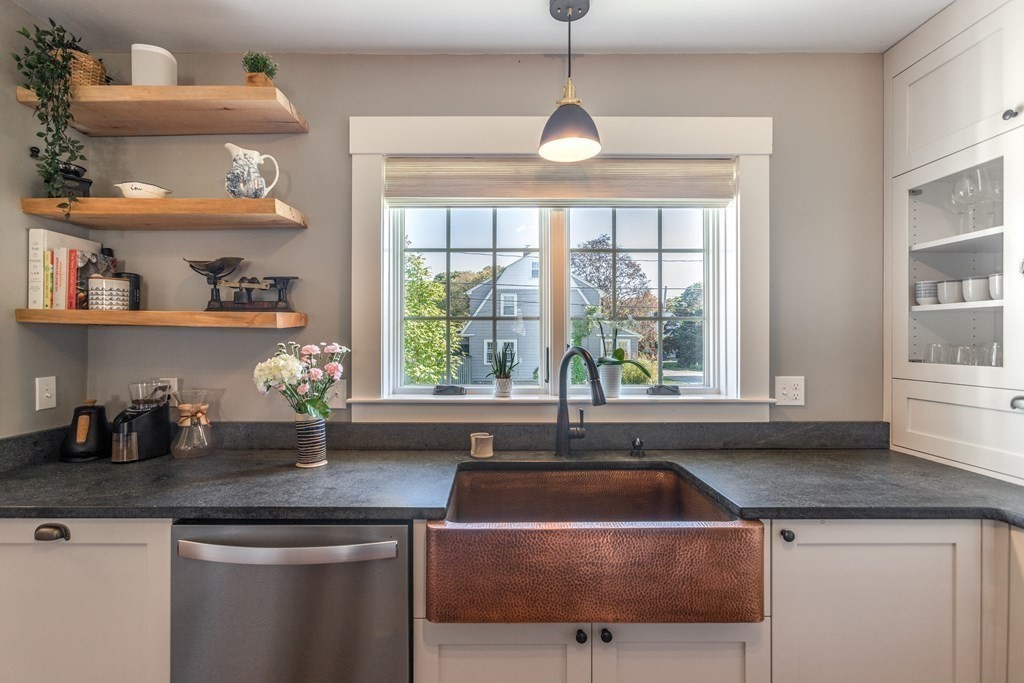 7 Charles Street Maynard, MA 01754 - Photo 3 of 33 a kitchen with a sink and a window