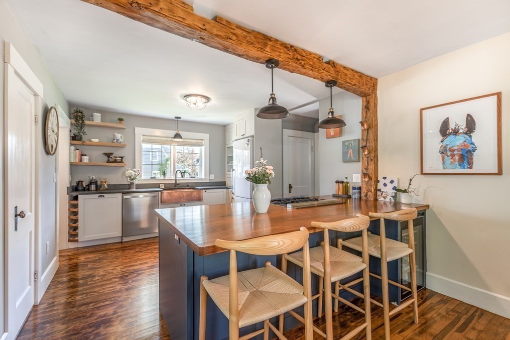7 Charles Street Maynard, MA 01754 - Photo 6 of 33 a view of a dining room with furniture and wooden floor