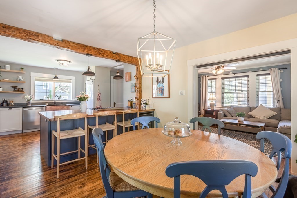 7 Charles Street Maynard, MA 01754 - Photo 7 of 33 a view of a dining room with furniture window and wooden floor