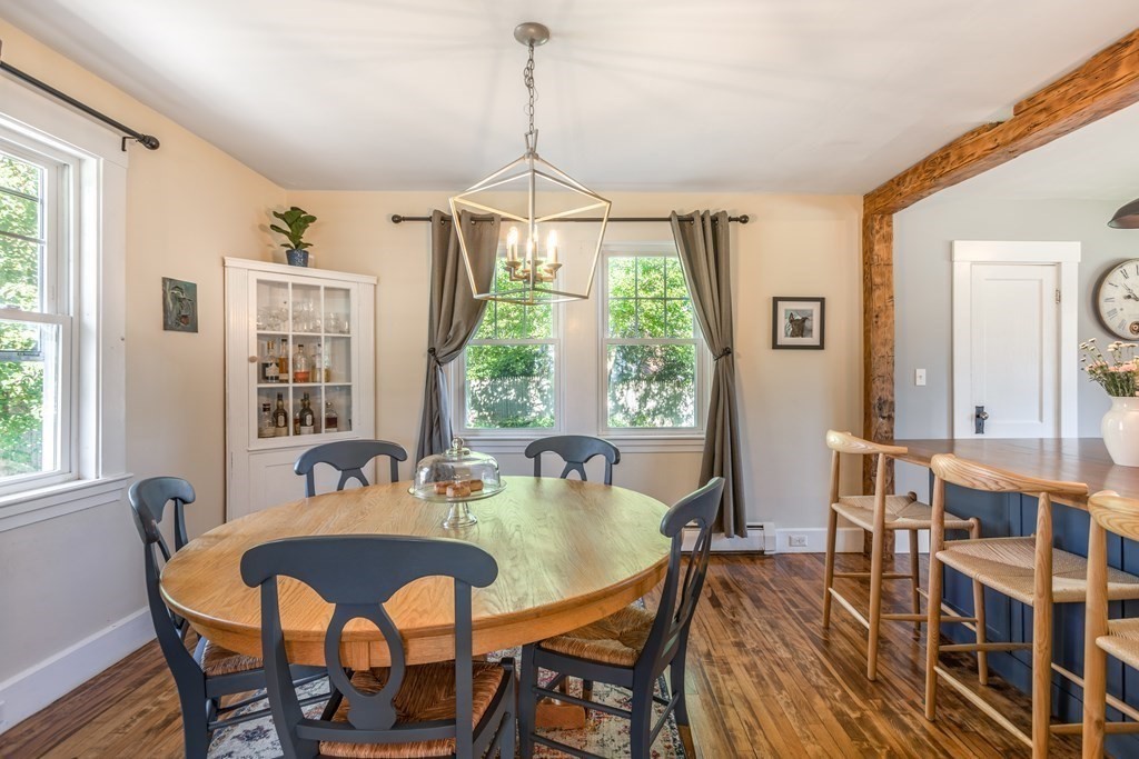 7 Charles Street Maynard, MA 01754 - Photo 9 of 33 a view of a dining room with furniture window and outside view