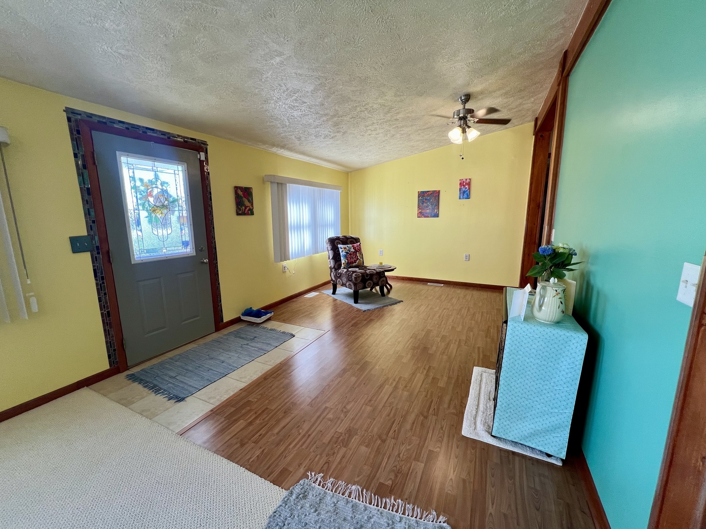 2302 East Leverett Road Champaign, IL 61822 - Photo 8 of 33 a living room with furniture and a wooden floor