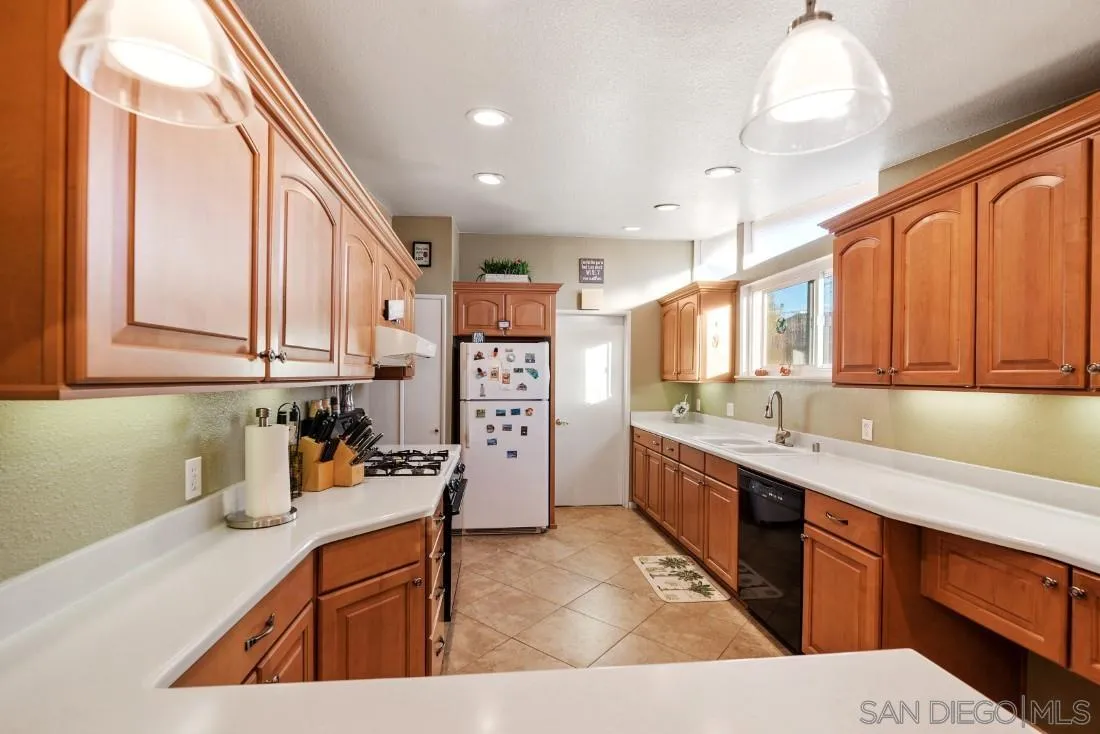 13850 Frame Road Poway, CA 92064 - Photo 18 of 44 a kitchen with lots of counter top space