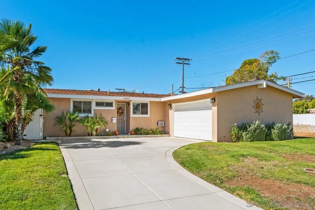 13850 Frame Road Poway, CA 92064 - Photo 2 of 44 a front view of a house with a yard and potted plants