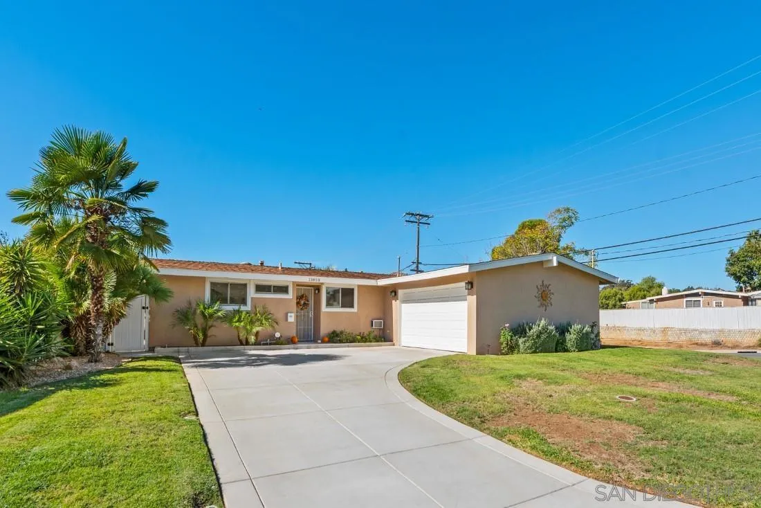 13850 Frame Road Poway, CA 92064 - Photo 3 of 44 a front view of a house with a yard
