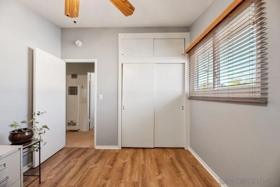 13850 Frame Road Poway, CA 92064 - Photo 31 of 44 a view of a room with a window and wooden floor