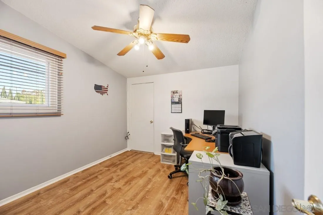 13850 Frame Road Poway, CA 92064 - Photo 32 of 44 a view of workspace with wooden floor windows