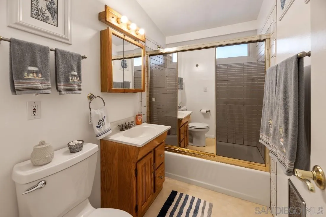 13850 Frame Road Poway, CA 92064 - Photo 33 of 44 a bathroom with a sink a toilet and shower