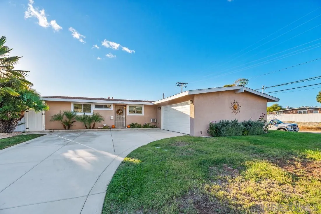 13850 Frame Road Poway, CA 92064 - Photo 6 of 44 a front view of a house with garden