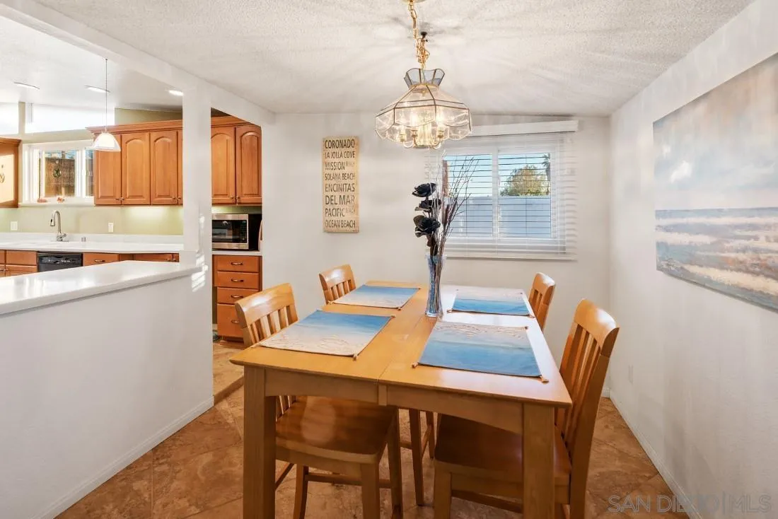 13850 Frame Road Poway, CA 92064 - Photo 9 of 44 a view of a dining room with furniture window and outside view