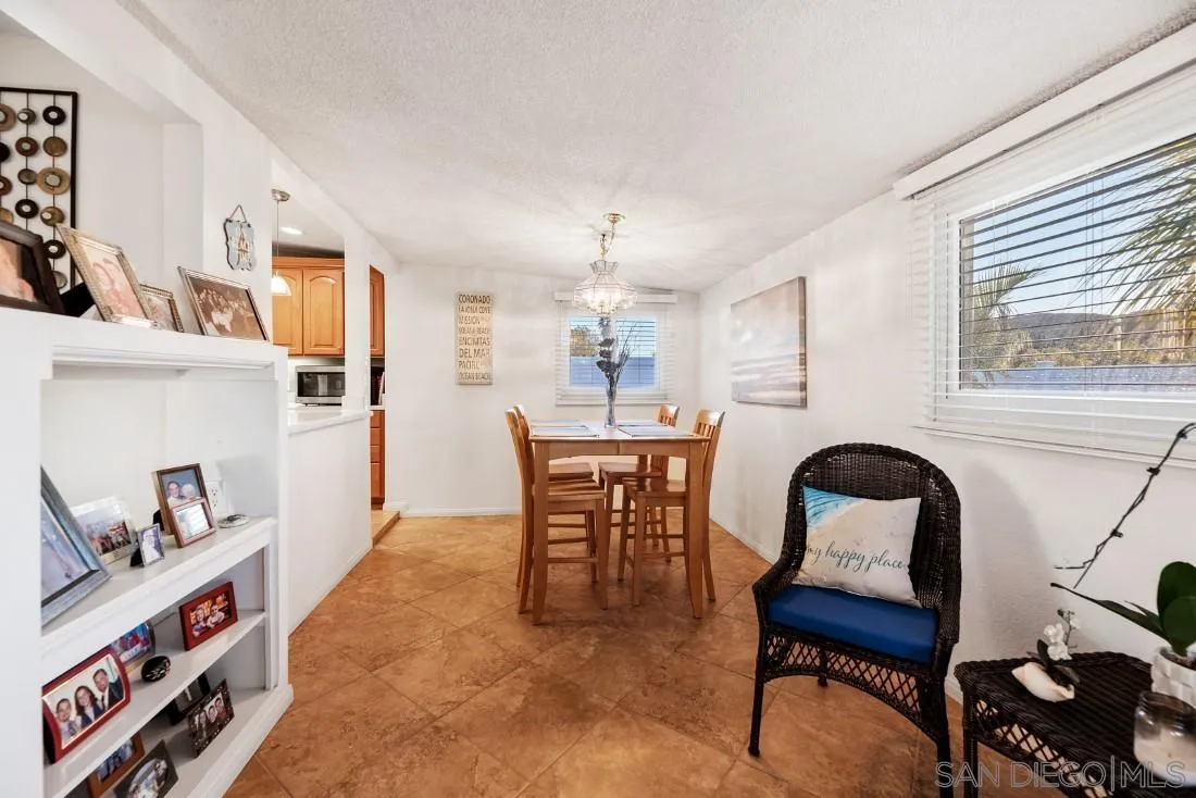 13850 Frame Road Poway, CA 92064 - Photo 10 of 44 a dining room with furniture and window