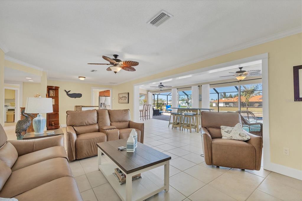 30 Buccaneer Bend Placida, FL 33946 - Photo 13 of 38 a living room with furniture and a view of kitchen