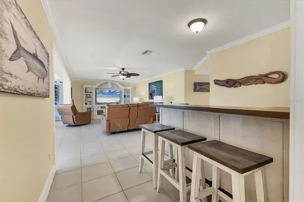 a kitchen that has a sink and a stove