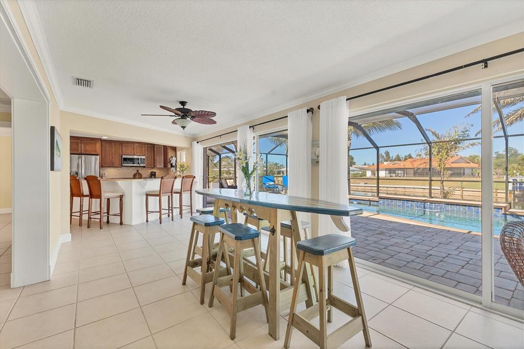 30 Buccaneer Bend Placida, FL 33946 - Photo 21 of 38 a view of a dining room with furniture window and outside view
