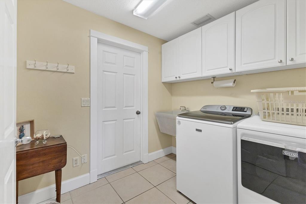 30 Buccaneer Bend Placida, FL 33946 - Photo 30 of 38 a view of a storage & utility room with washer and dryer