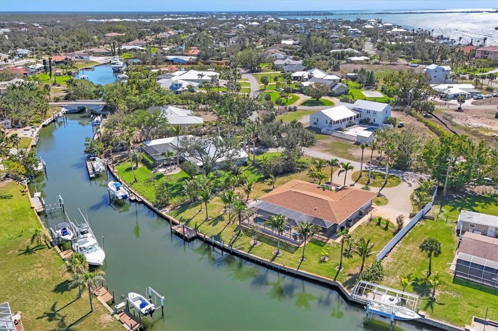 30 Buccaneer Bend Placida, FL 33946 - Photo 4 of 38 an aerial view of a city with lake view