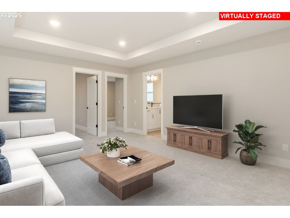 2474 North Vale Street Newberg, OR 97132 - Photo 7 of 11 a living room with furniture a flat screen tv and a potted plant