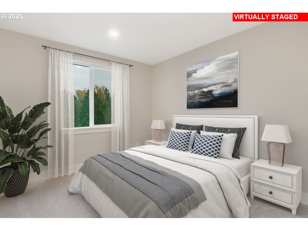 2474 North Vale Street Newberg, OR 97132 - Photo 8 of 11 a bedroom with a large bed and a potted plant
