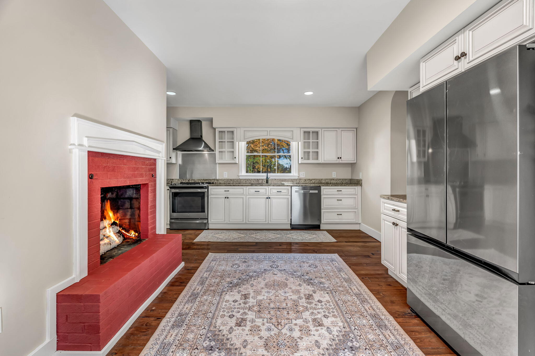 180 Main Road North Hampden, ME 04444 - Photo 13 of 129 Kitchen - Fireplace virtual stage