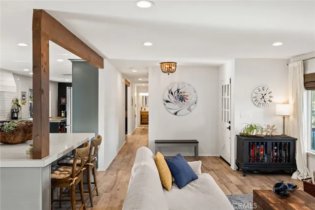 a bedroom with furniture and a fireplace