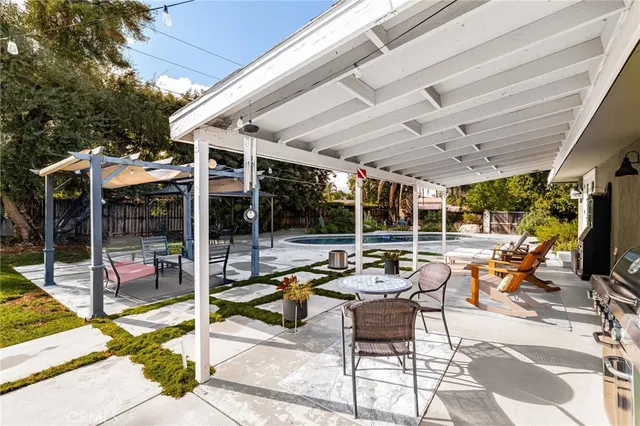 a outdoor space with lots of tables and chairs