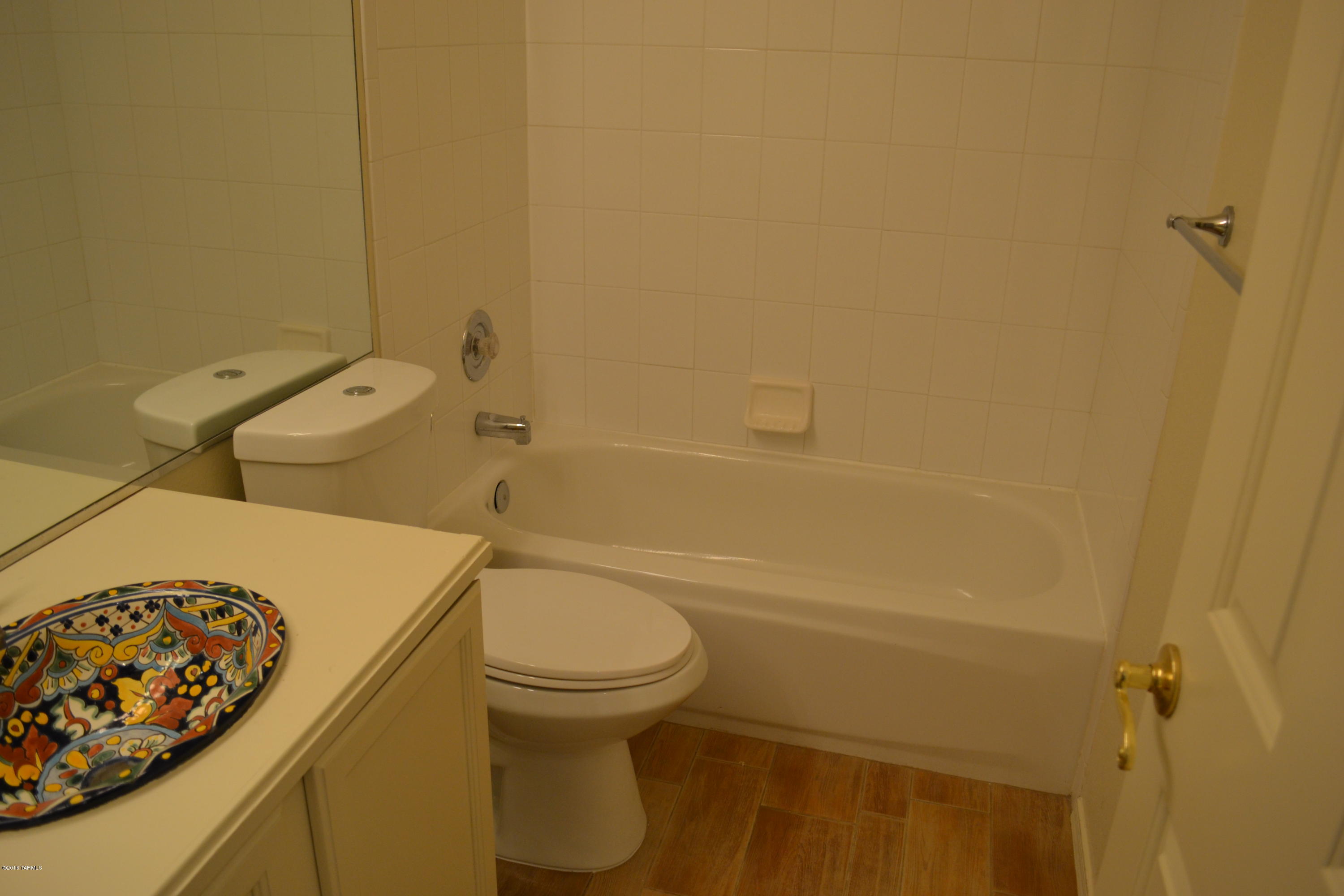 5640 North Cherokee Ridge Road Tucson, AZ 85750 - Photo 20 of 39 a bathroom with a toilet and a shower