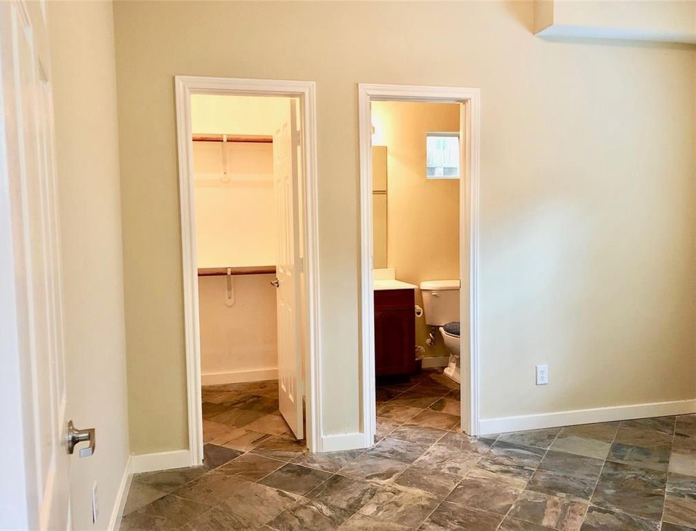 918 West 26th Street Houston, TX 77008 - Photo 16 of 19 a view of a bathroom with a walk in closet