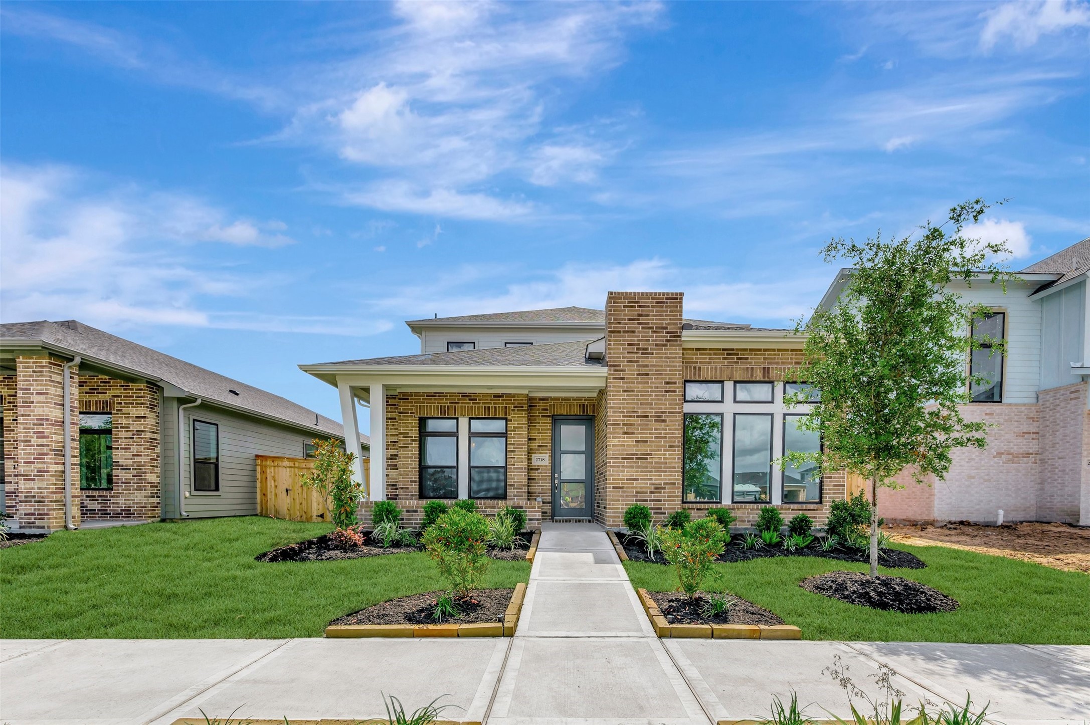 2718 Cottage Place Rosharon, TX 77583 - Photo 2 of 50 front view of a house with a yard
