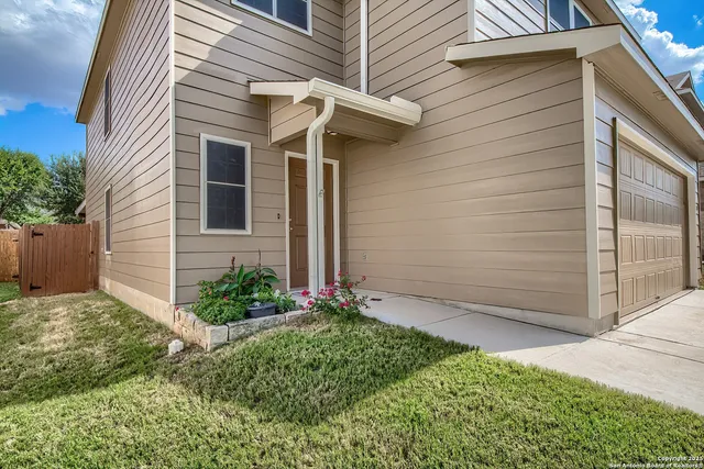 a view of a house with garage