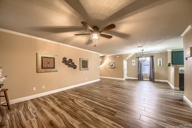 a view of a livingroom with a ceiling fan