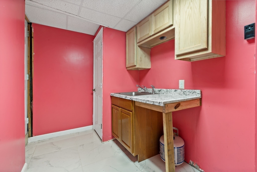 45 Fourth Street Worcester, MA 01602 - Photo 17 of 21 a utility room with dryer and washer