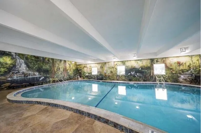 a view of a swimming pool and outdoor space