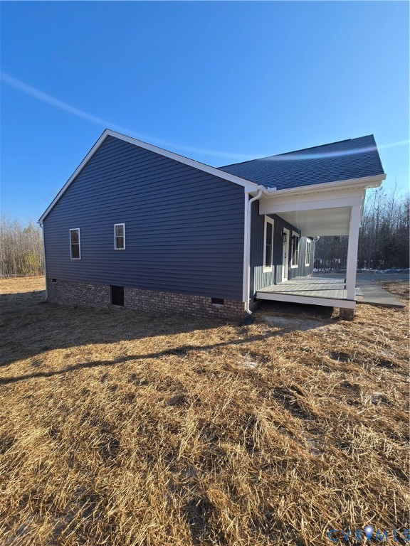 1781 Bumpass Road Bumpass, VA 23024 - Photo 6 of 26 a house view with a backyard space