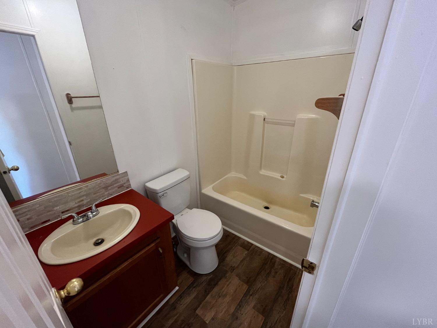 33 Pin Oak Court Evington, VA 24550 - Photo 15 of 19 a bathroom with a sink toilet and shower