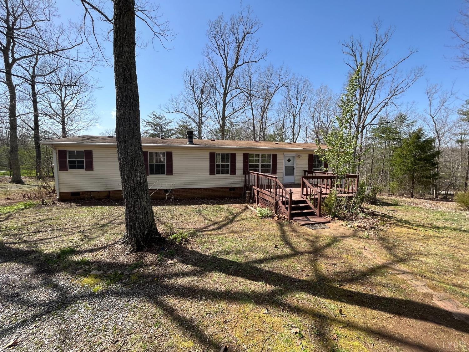 33 Pin Oak Court Evington, VA 24550 - Photo 18 of 19 a view of a house with chairs and sitting area