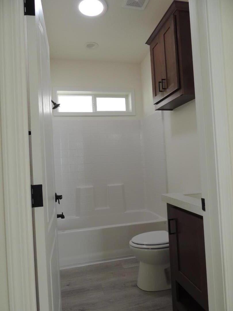 100 North Rodeo Gulch Road, Unit 108 Soquel, CA 95073 - Photo 12 of 17 a bathroom with a toilet and a shower