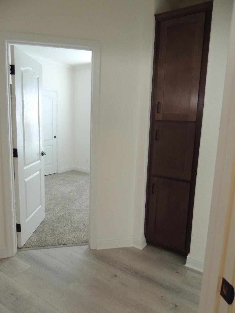 100 North Rodeo Gulch Road, Unit 108 Soquel, CA 95073 - Photo 13 of 17 an empty room with wooden door