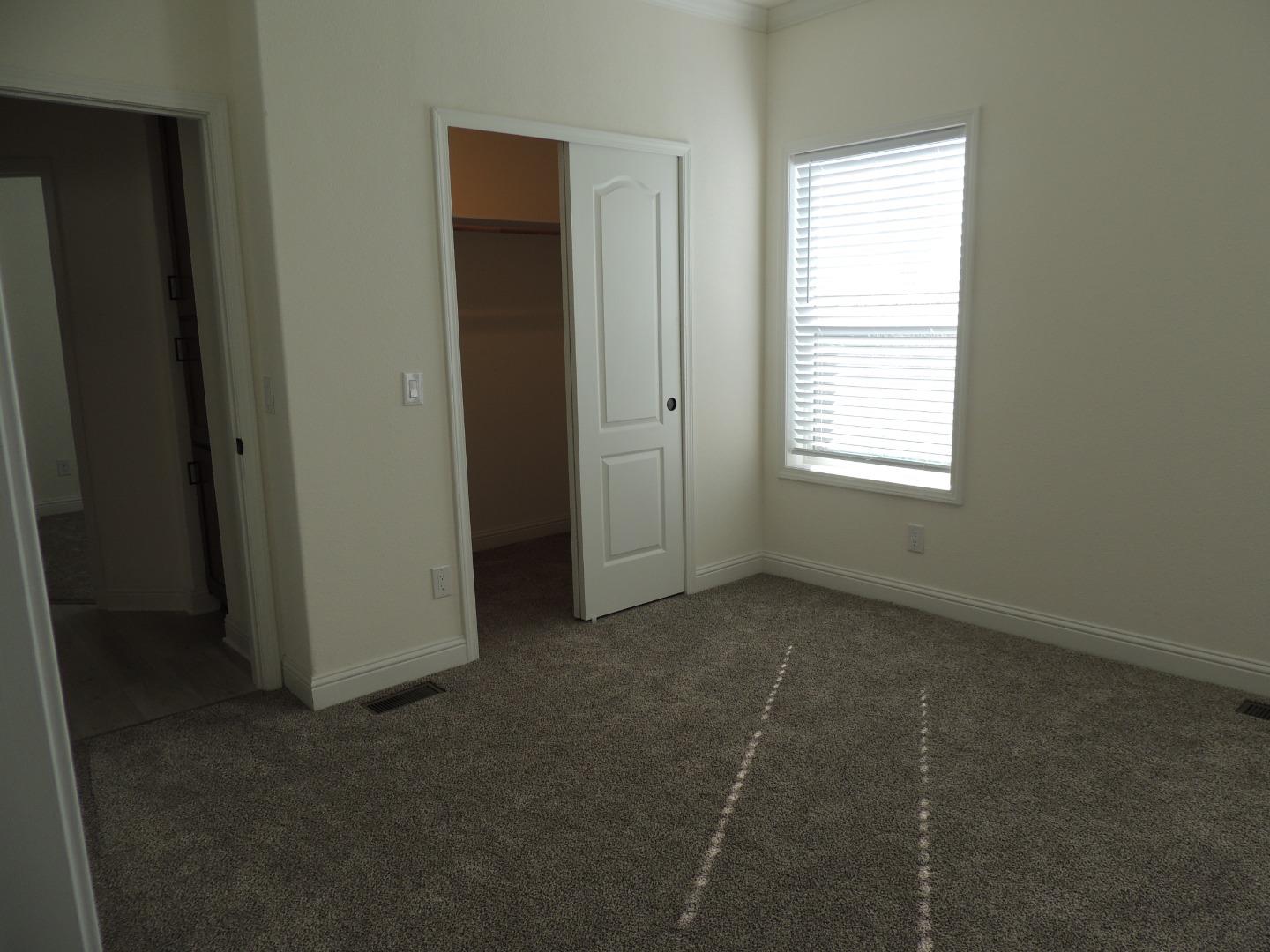 100 North Rodeo Gulch Road, Unit 108 Soquel, CA 95073 - Photo 8 of 17 a view of an empty room with a window