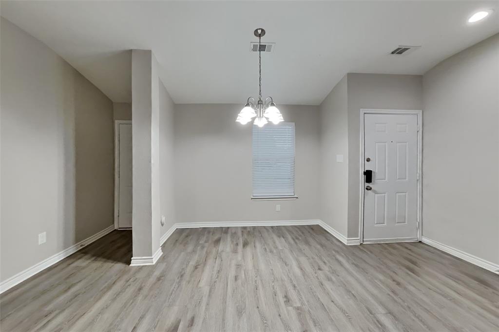 105 Independence Trail Forney, TX 75126 - Photo 6 of 18 a view of a room with wooden floor and ceiling fan