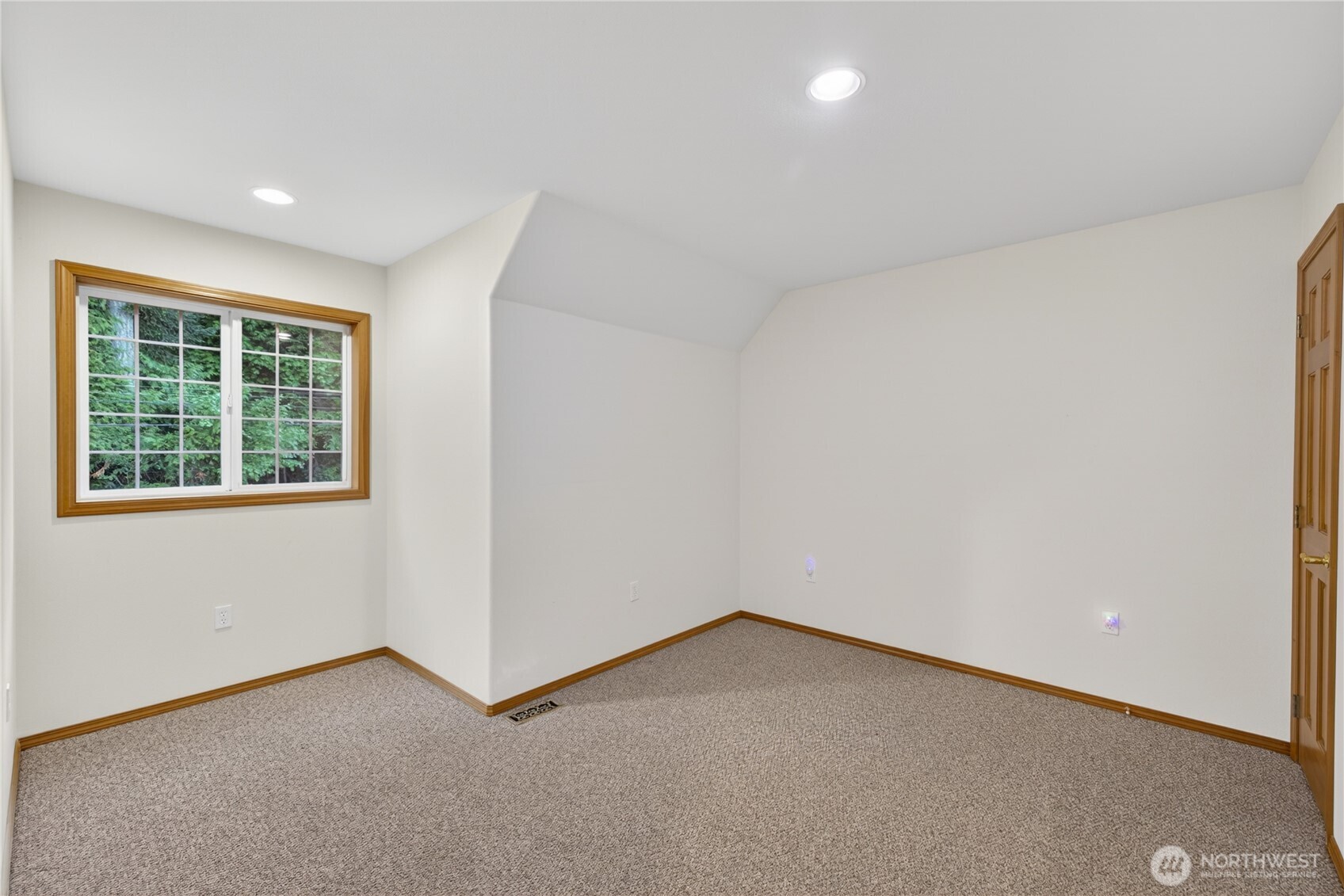 4623 Guemes Island Road Anacortes, WA 98221 - Photo 19 of 40 an empty room with a window