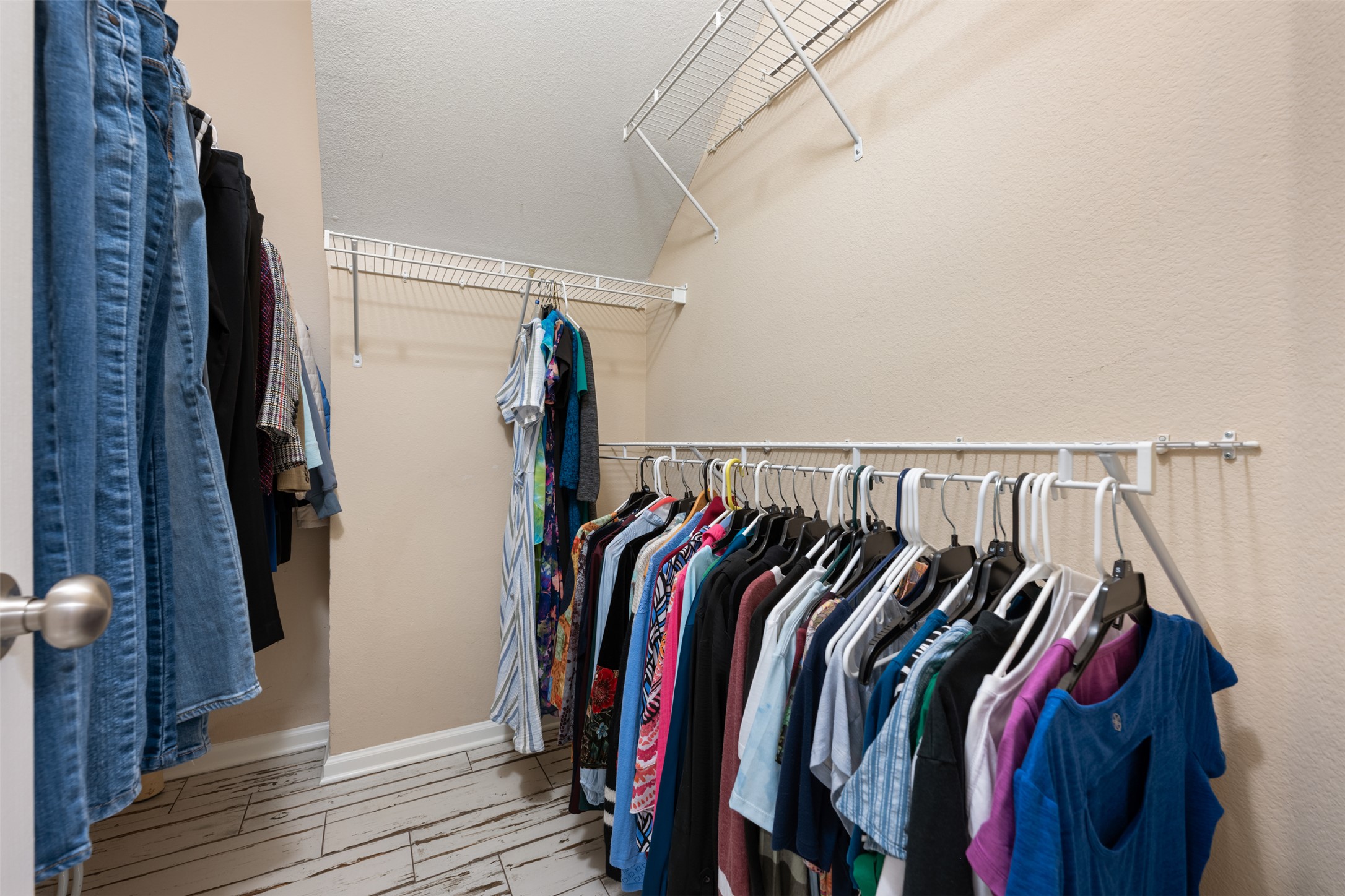 11203 Ranch Road 2222, Unit 1407 Austin, TX 78732 - Photo 14 of 40 There's also a walk-in closet for the primary suite.