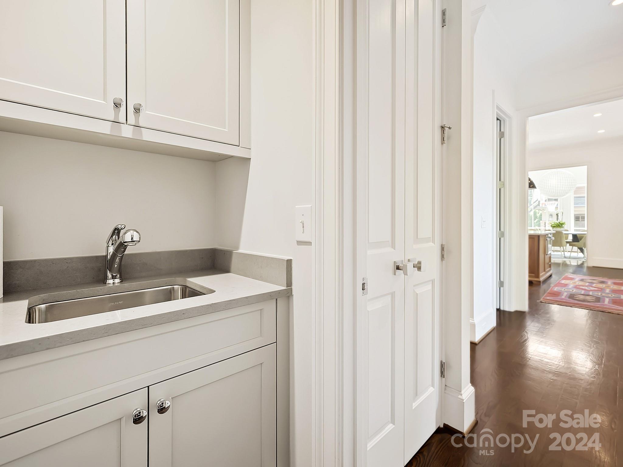 1621 Sterling Road Charlotte, NC 28209 - Photo 20 of 48 a kitchen with a sink and cabinets