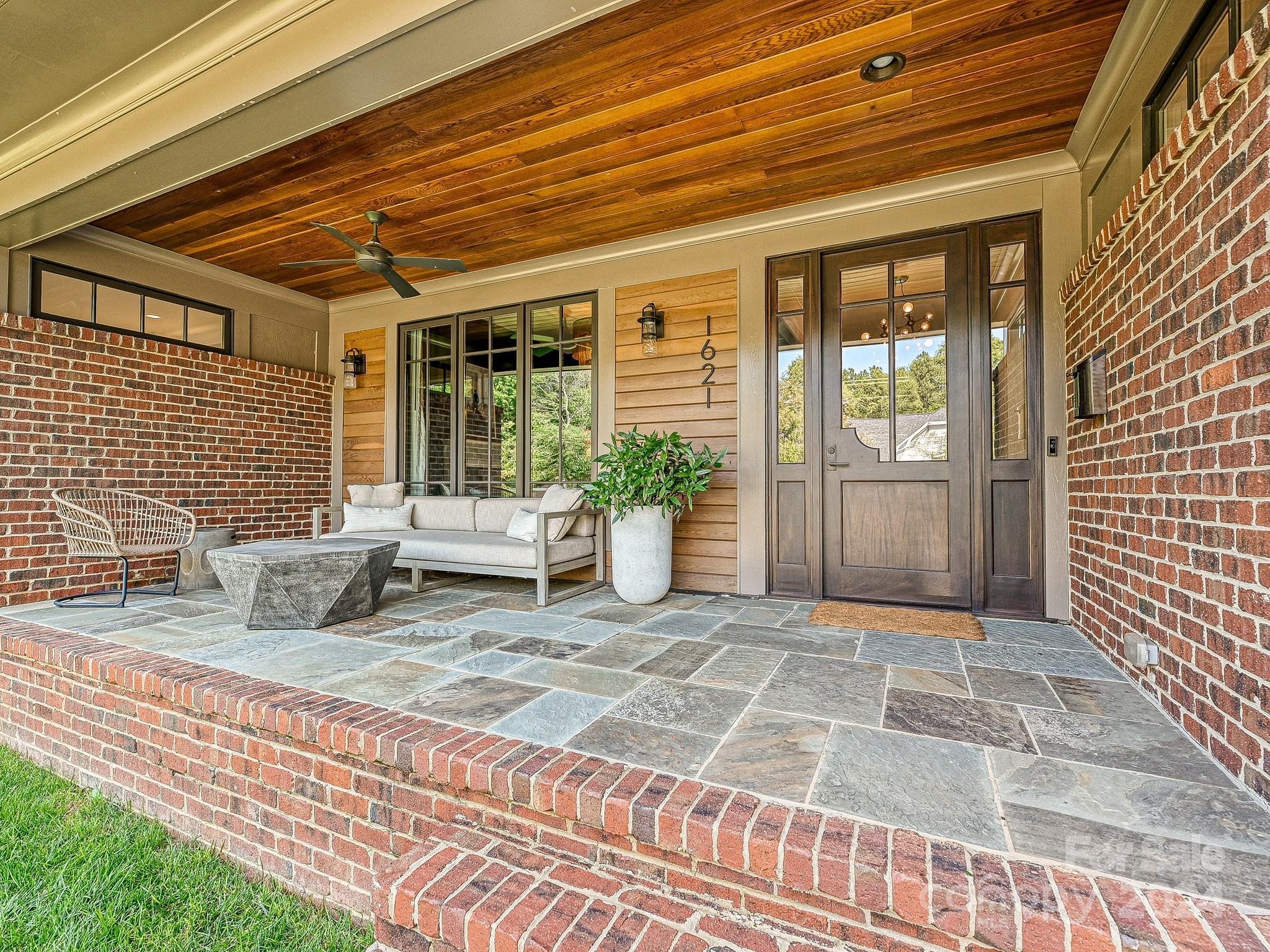 1621 Sterling Road Charlotte, NC 28209 - Photo 2 of 48 a view of a lounge chair in the patio