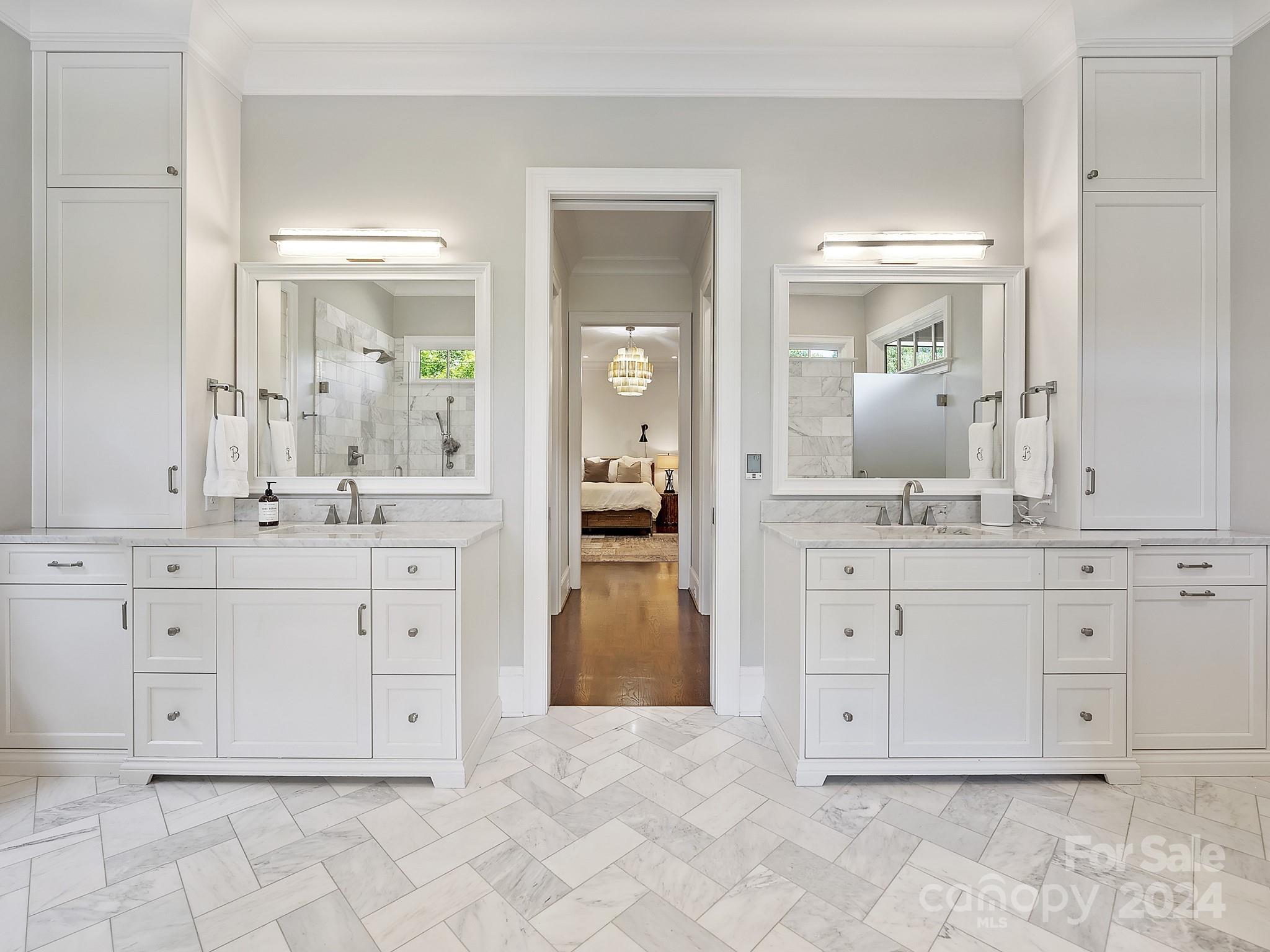 1621 Sterling Road Charlotte, NC 28209 - Photo 25 of 48 a spacious bathroom with a granite countertop sink and a mirror