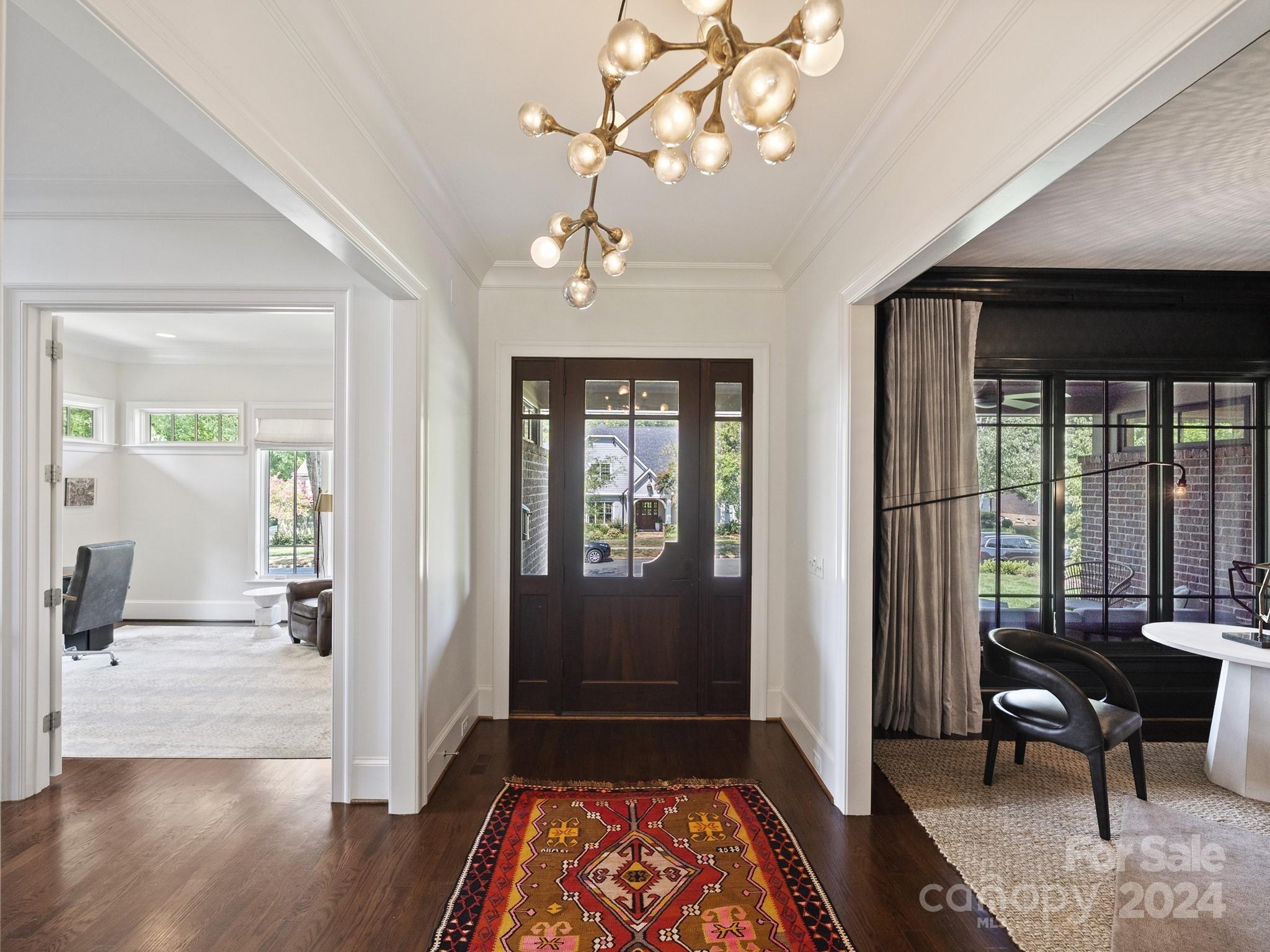 1621 Sterling Road Charlotte, NC 28209 - Photo 3 of 48 a view of a livingroom with wooden floor and furniture