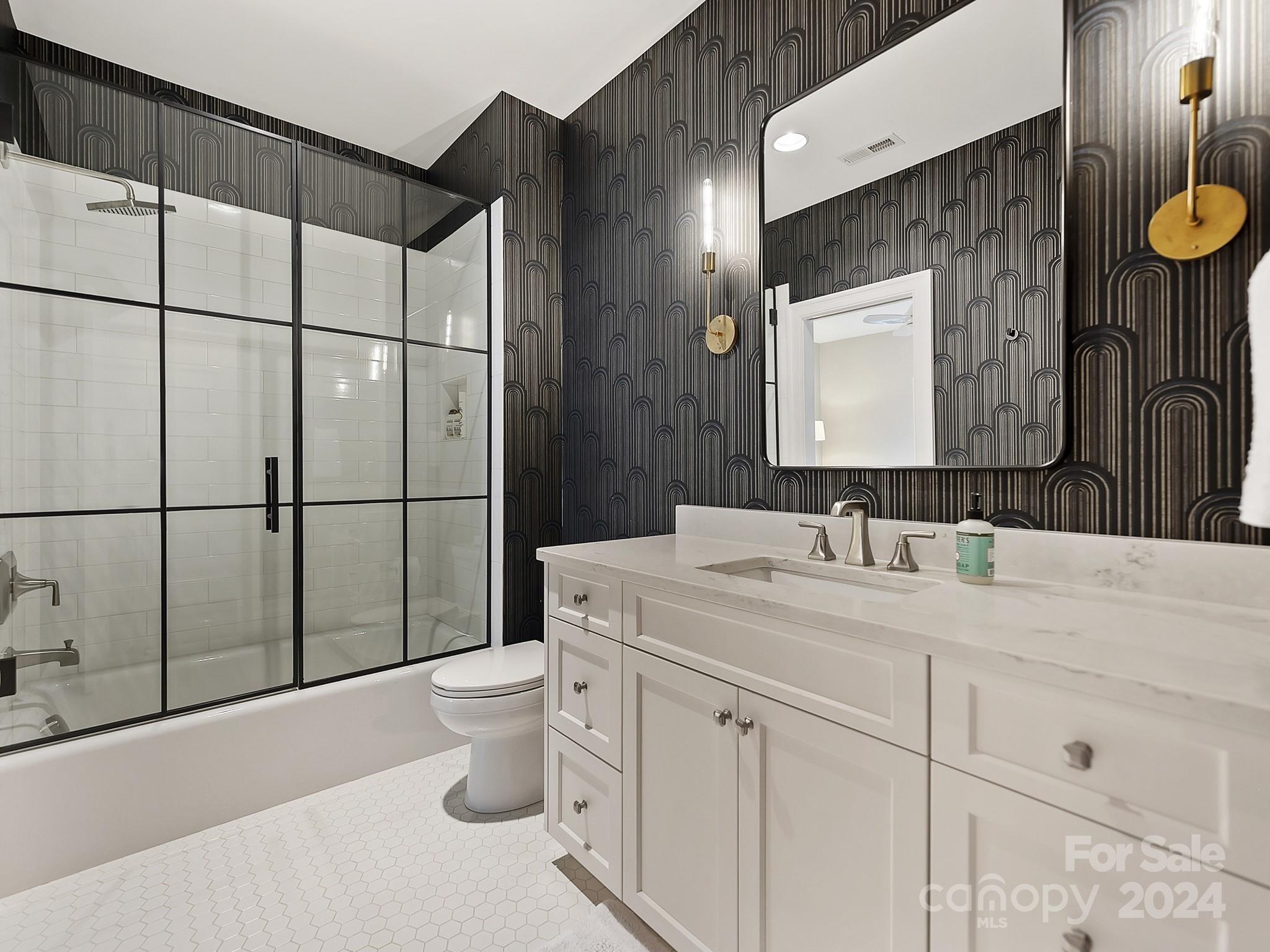 1621 Sterling Road Charlotte, NC 28209 - Photo 34 of 48 a bathroom with a sink toilet and shower