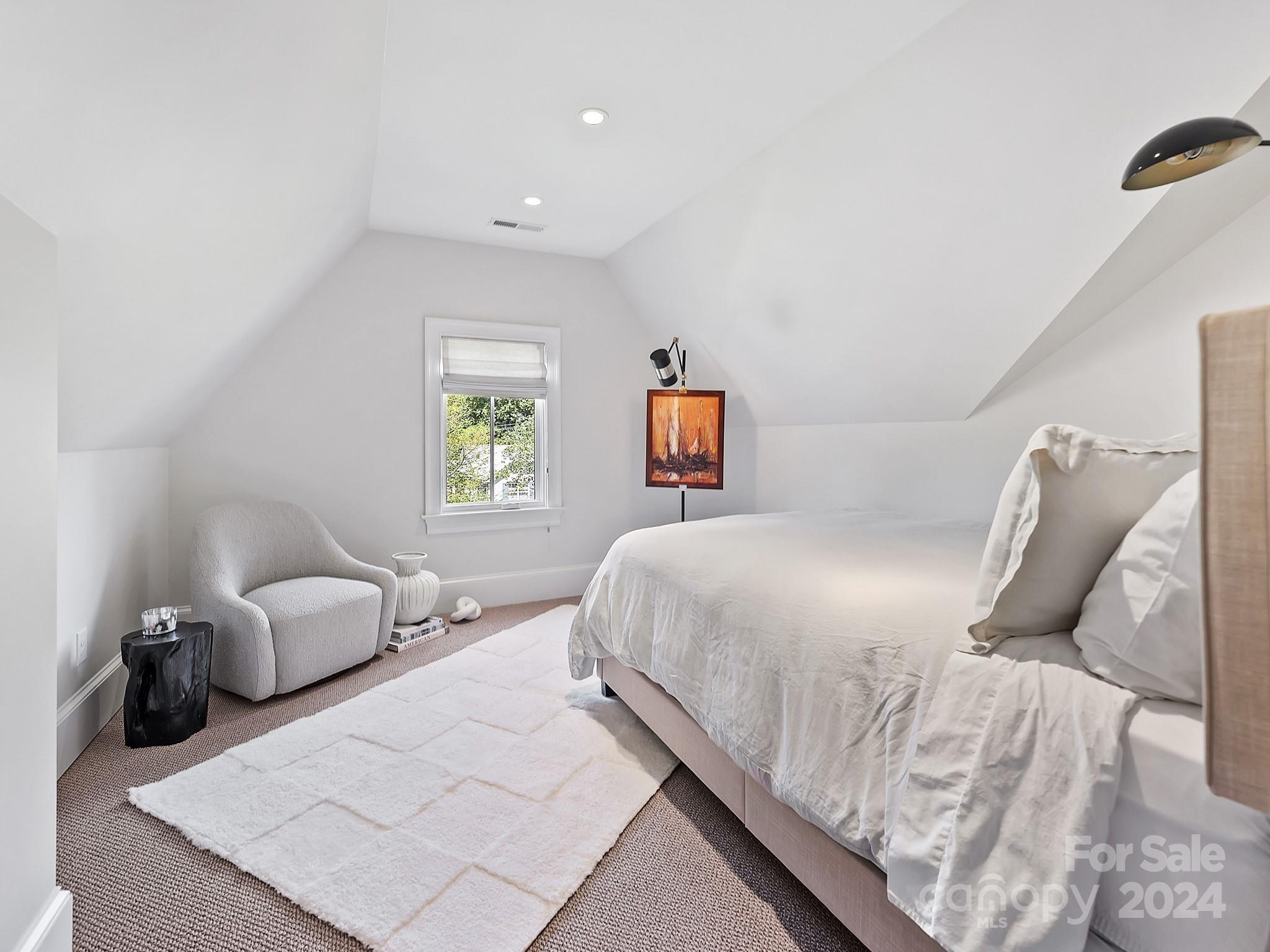 1621 Sterling Road Charlotte, NC 28209 - Photo 35 of 48 a bedroom with a bed and window