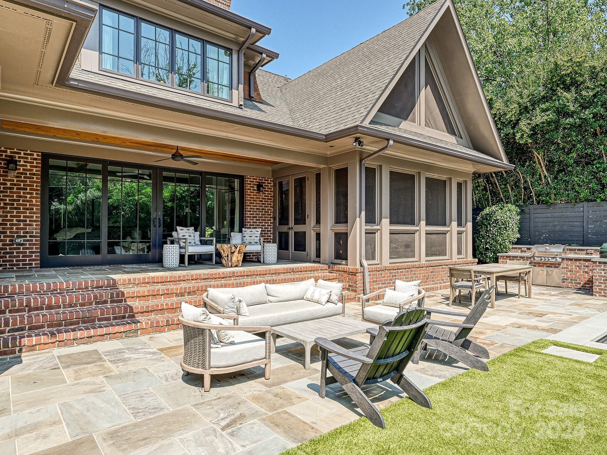 1621 Sterling Road Charlotte, NC 28209 - Photo 44 of 48 a view of a house with swimming pool and sitting area