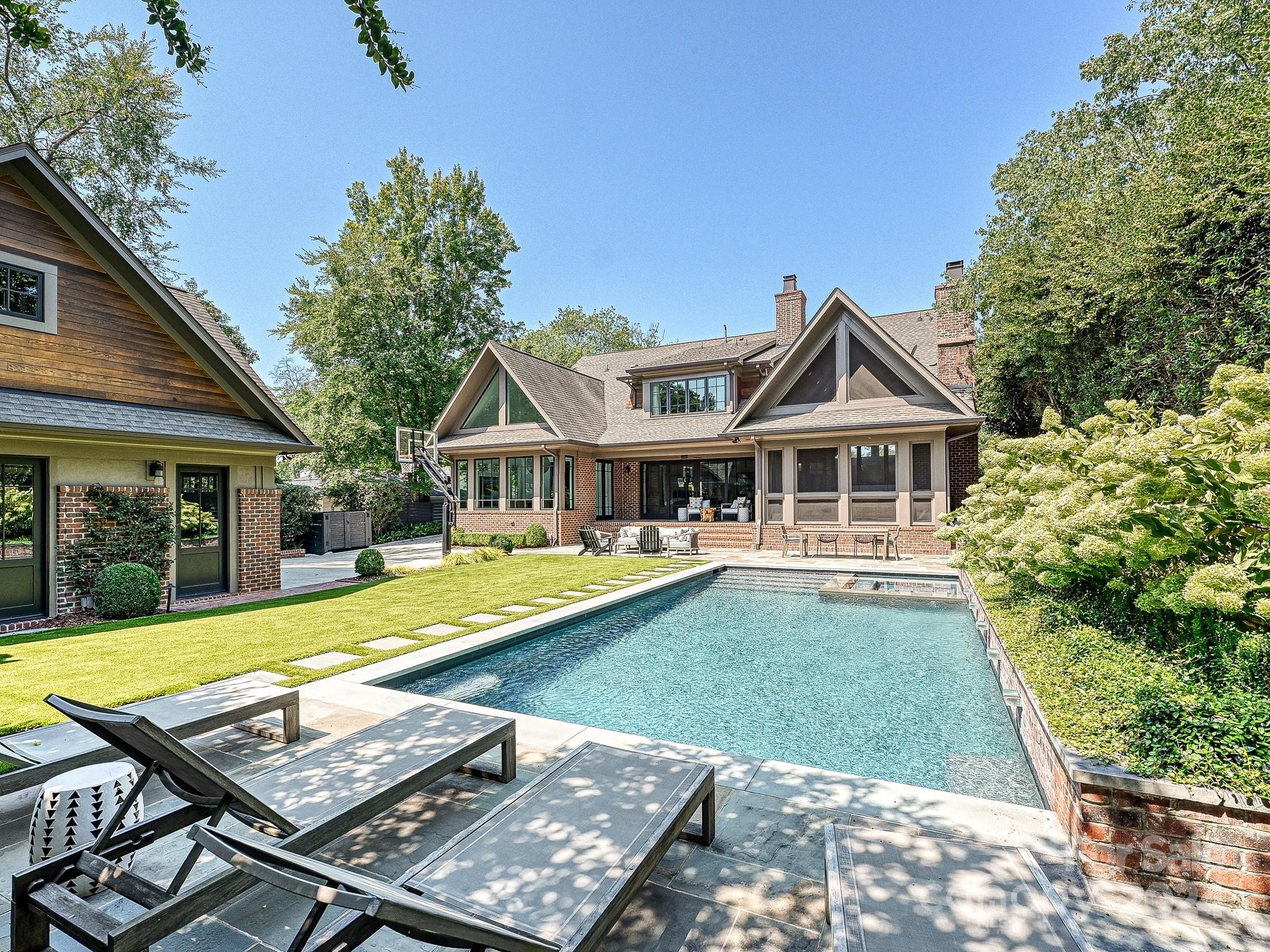 1621 Sterling Road Charlotte, NC 28209 - Photo 48 of 48 a view of a house with swimming pool and porch