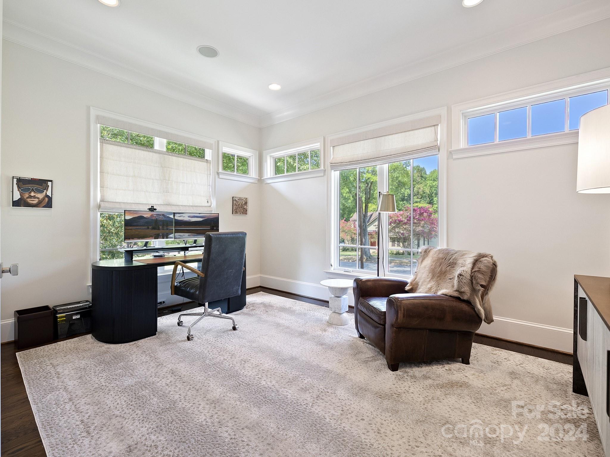1621 Sterling Road Charlotte, NC 28209 - Photo 5 of 48 a living room with furniture and large windows